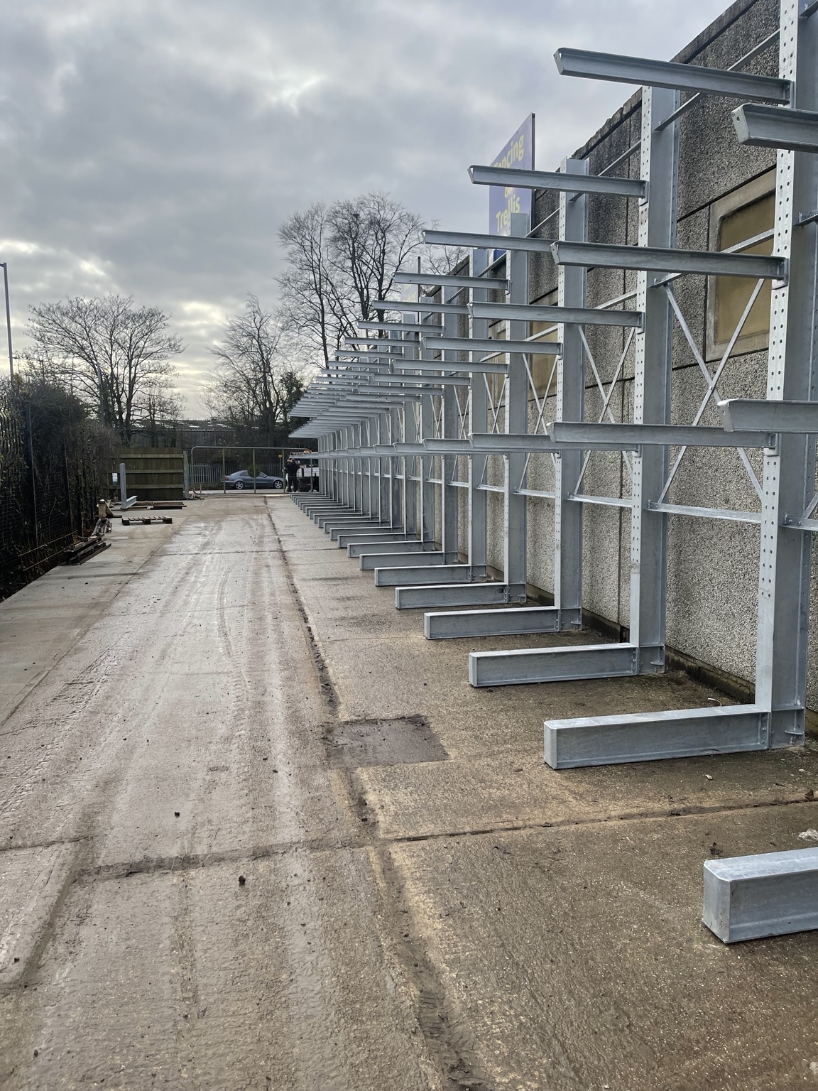 Galvanised cantilever racking installed outside an industrial building